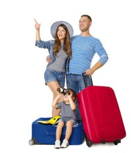 Young Family Traveling with Suitcases. Child sitting on Luggage with Binoculars Looking up.