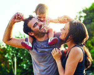 Shot of a young family outdoors